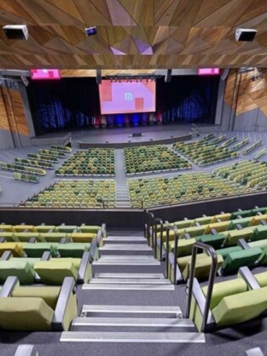 Plenary session in a Melbourne convention hall